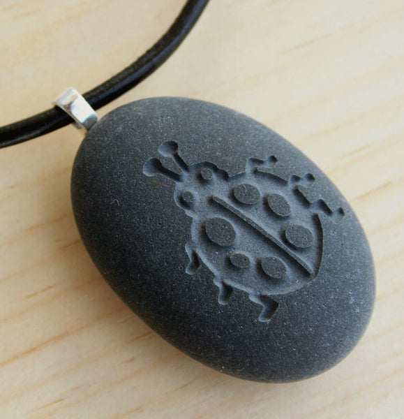 Ladybug pendant with cord - Tiny PebbleGlyph (C) - Engraved beach stone necklace