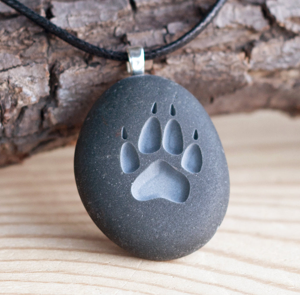 Wolf paw print engraved stone necklace Tiny PebbleGlyph C necklac SJEngraving