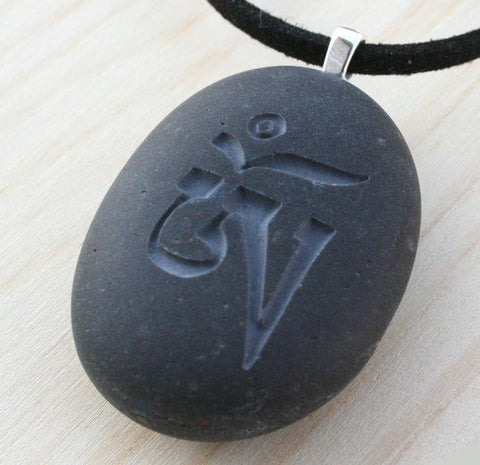 Tibetan Om - Tiny PebbleGlyph(c) Pendent - engraved beach stones